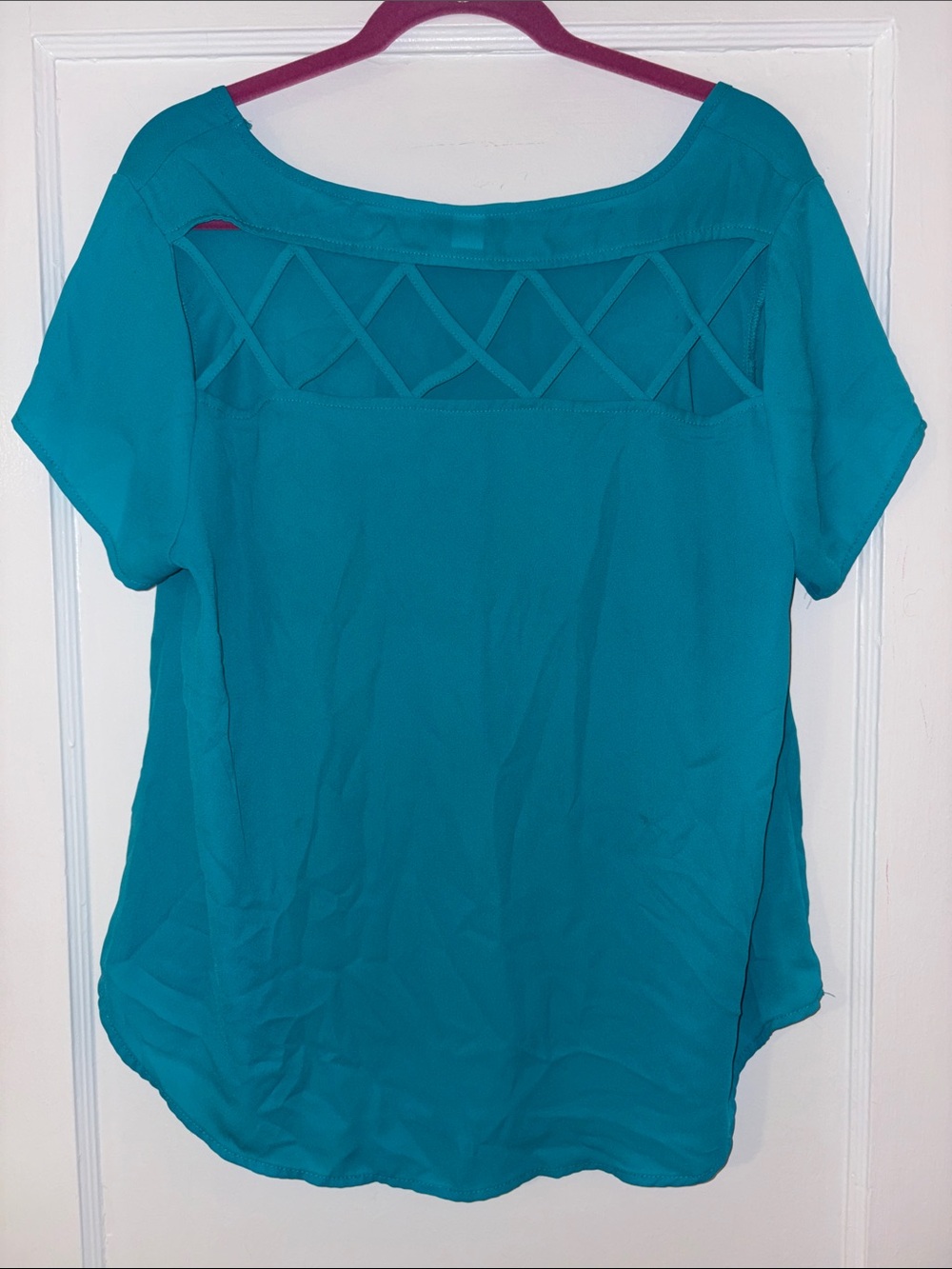 Torrid teal cross back blouse